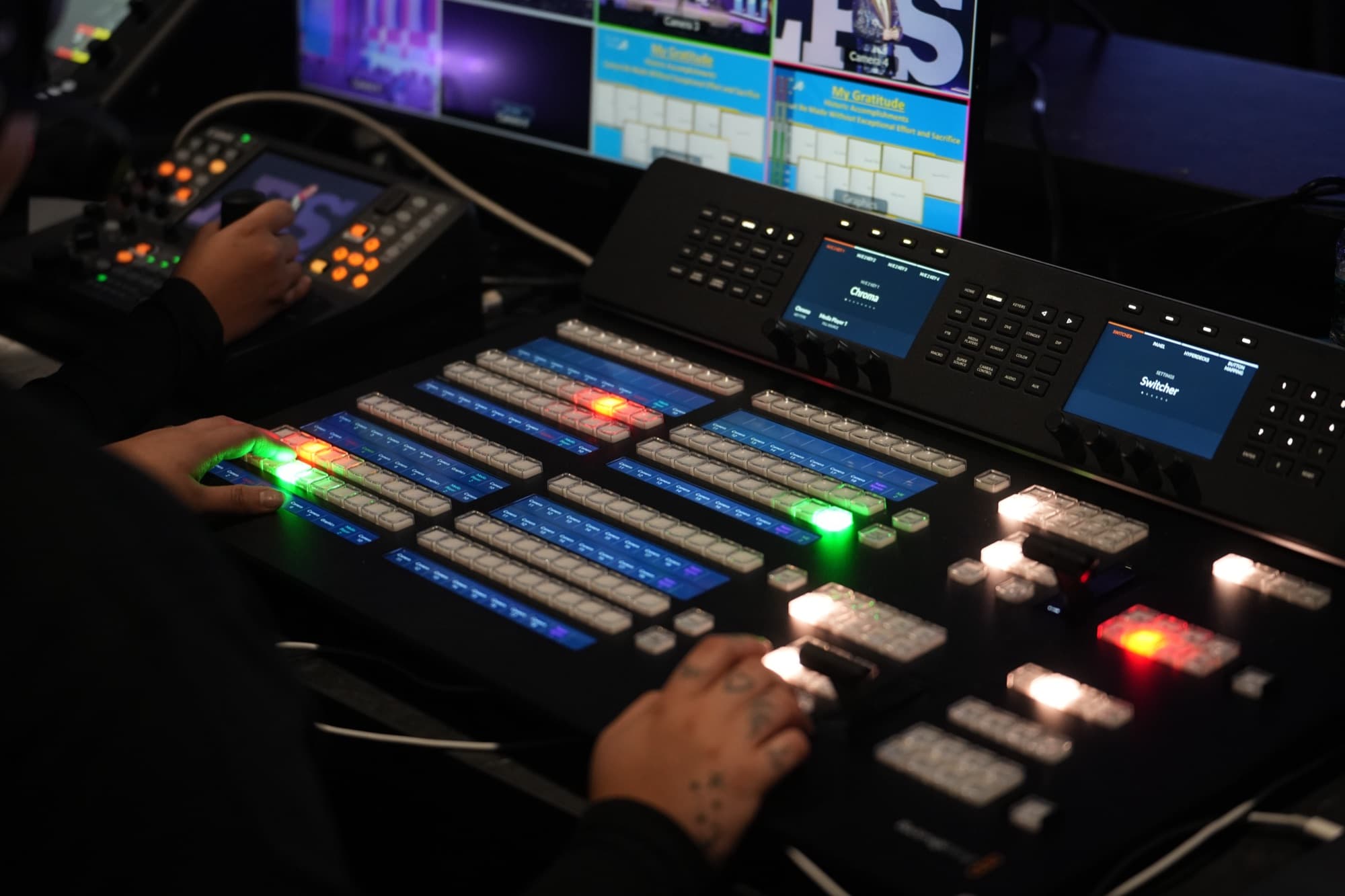 LCP crew operating the lighting and video control desk during the kickoff event