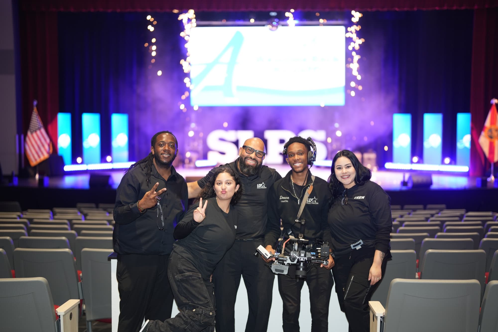The LCP Multimedia crew on stage after the SLPS kickoff event