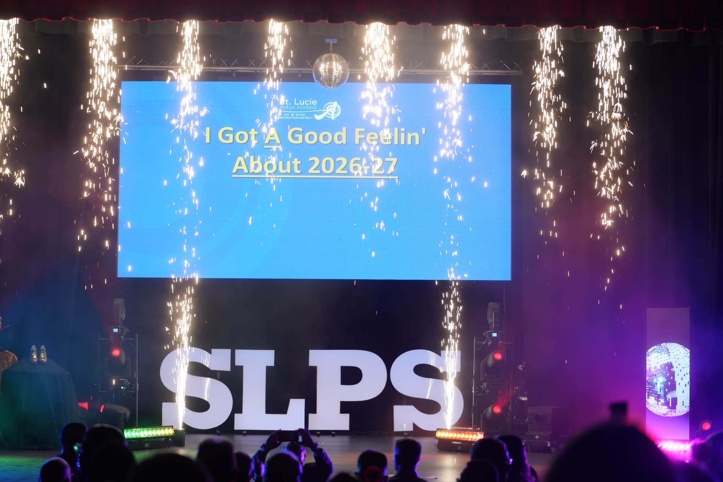 Large-scale stage production with pyrotechnics and confetti during the SLPS kickoff event