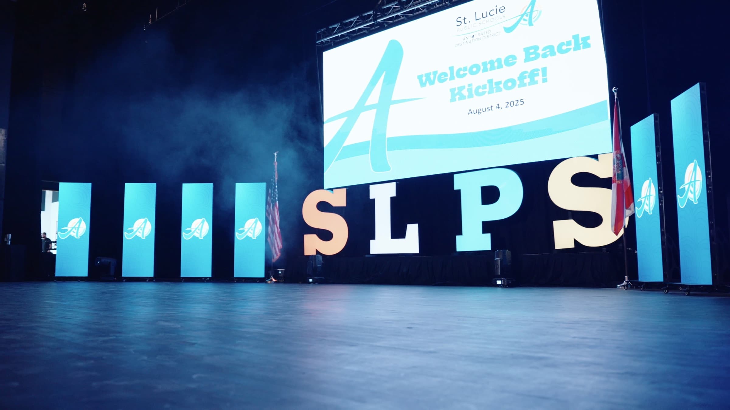 Side angle of the full LED wall installation on stage at the SLPS kickoff event